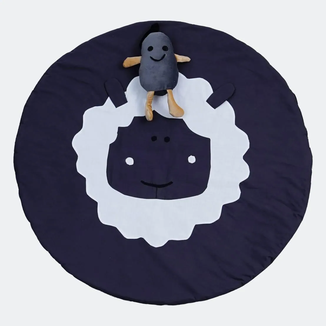 Round baby play mat with a smiling face and a soft toy