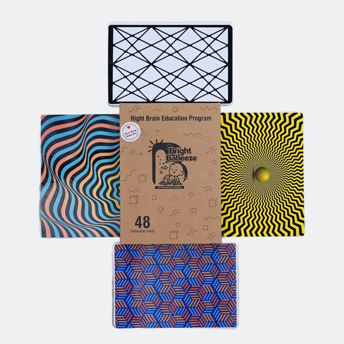High-contrast pattern cards for babies around a Right Brain Education card box