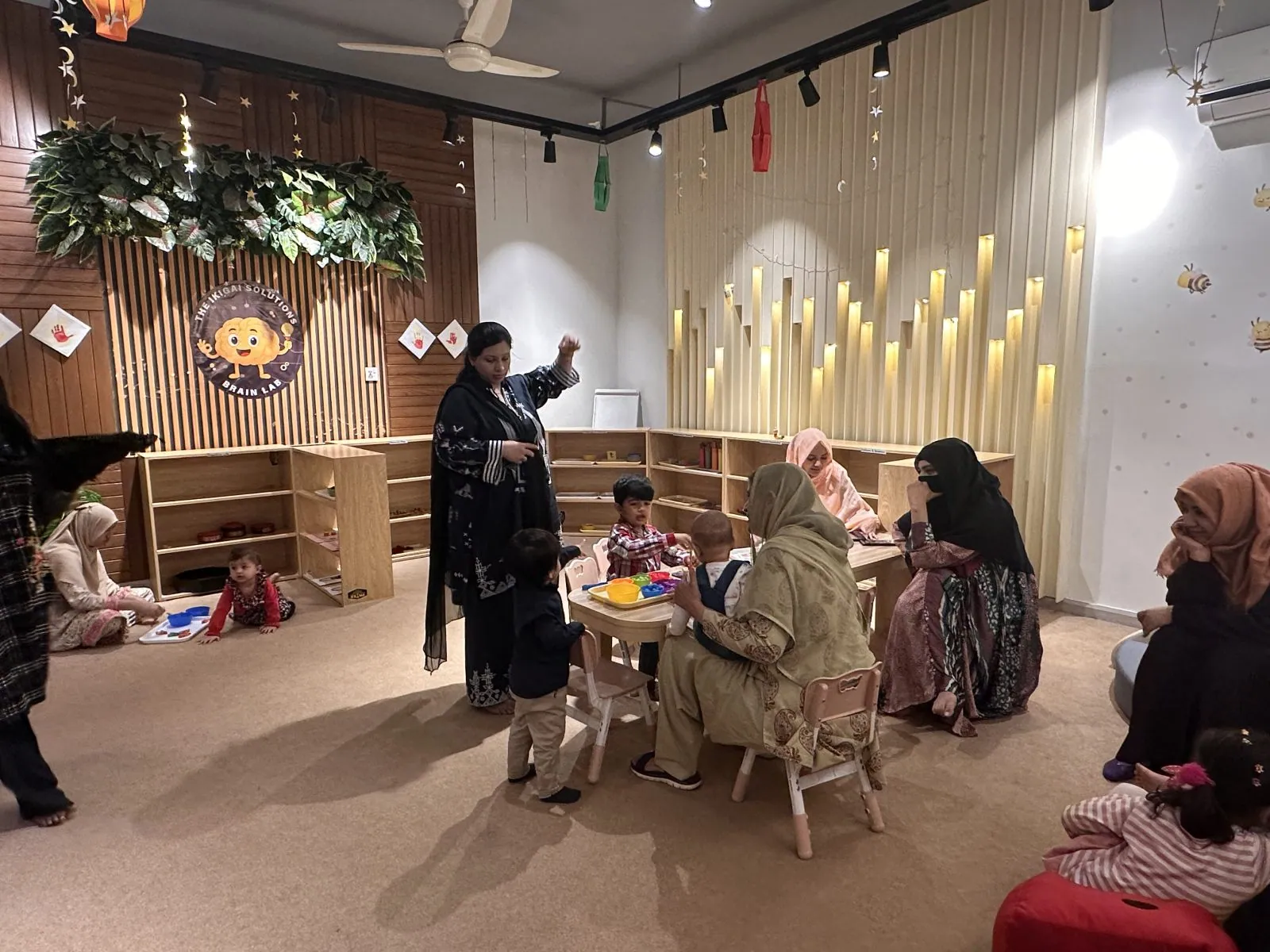 Toddler exploring a sensory activity at the Saturday program